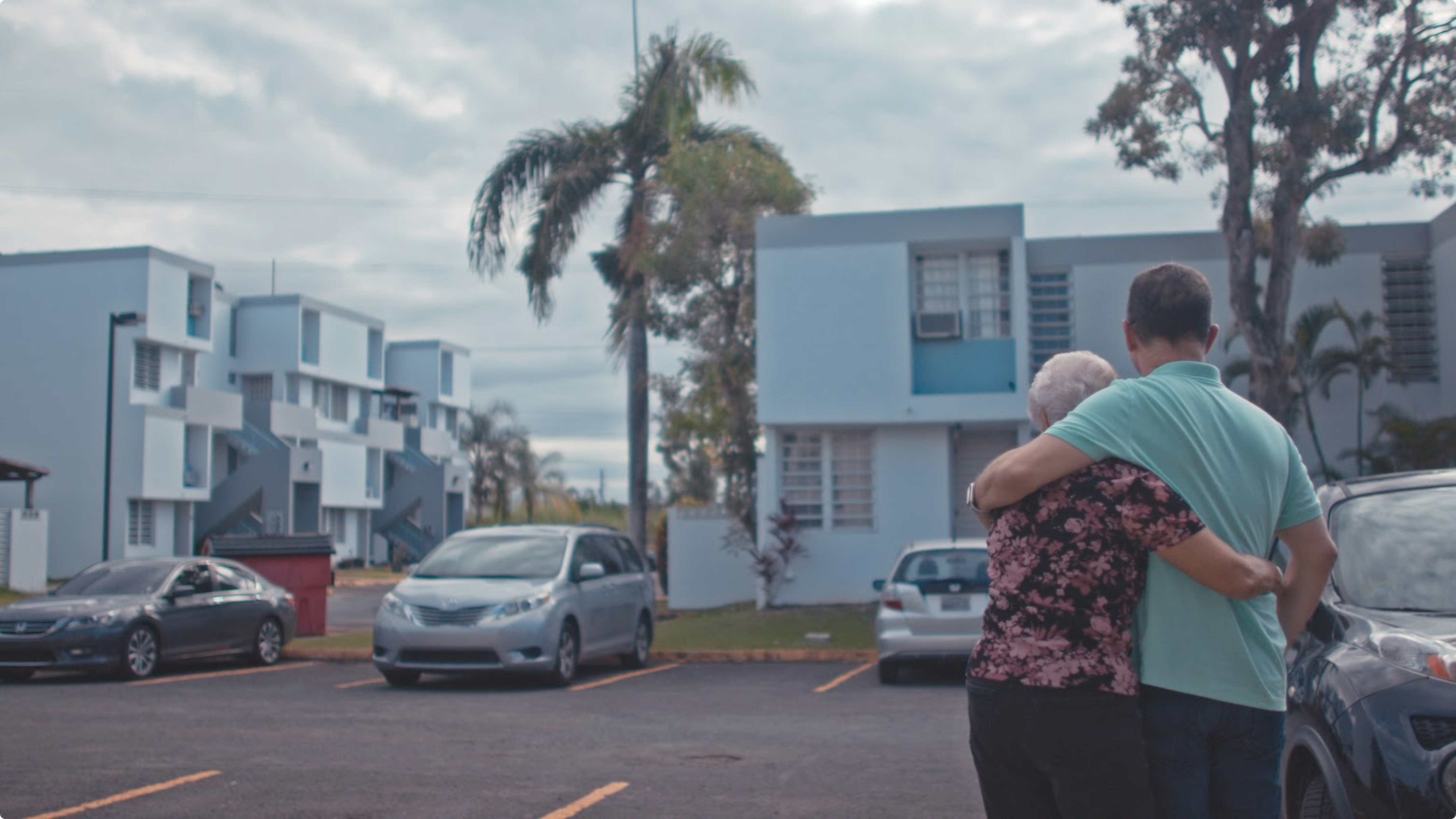 Googler with family member after a hurricane in Puerto Rico.