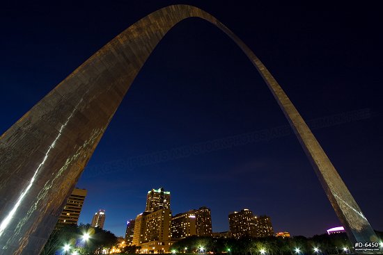 Arch closeup over city at twilight