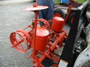 This is a picture of a corn planter that sold at the auction in Bloomington, IL. It sold for $650.00!