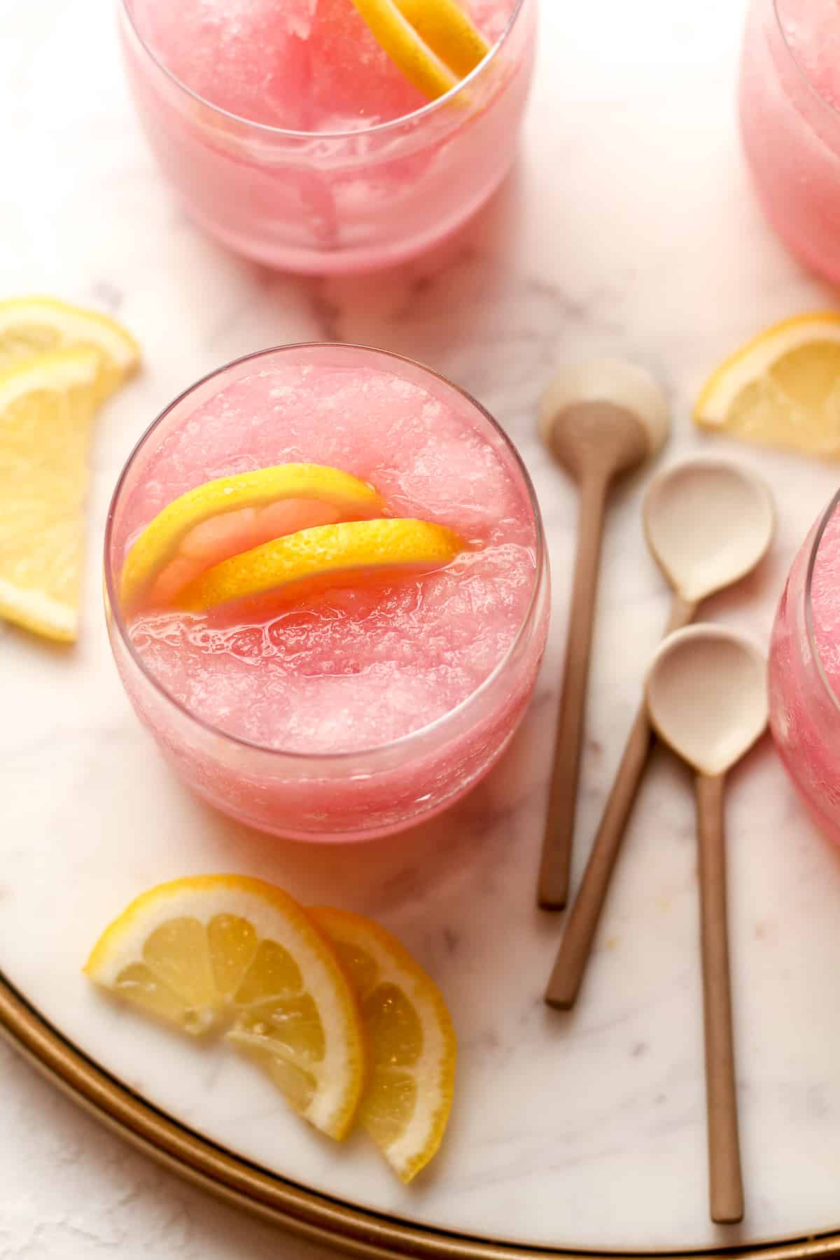 Overhead view of some pink slushies with lemonade.