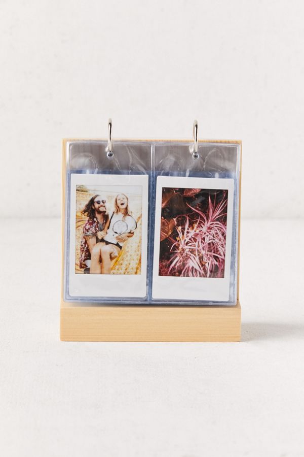 photo of a gold flip frame for instant photos