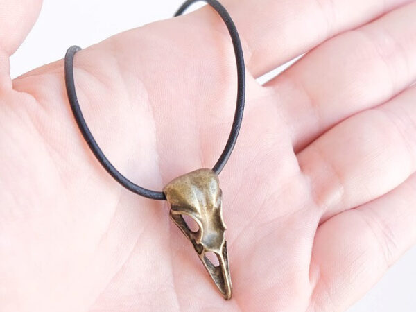 BRONZE RAVEN SKULL NECKLACE ON HAND