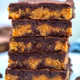 Peanut Butter Brownies are chewy, moist, and made rich with a layer of peanut butter filling! #brownies #peanutbutter #brownierecipe #sweetandsavorymeals #dessertrecipes