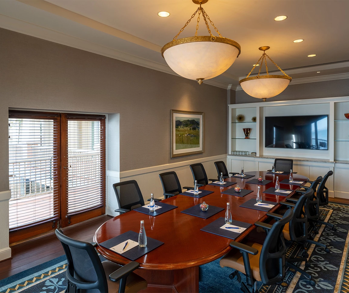 a room with a table and chairs