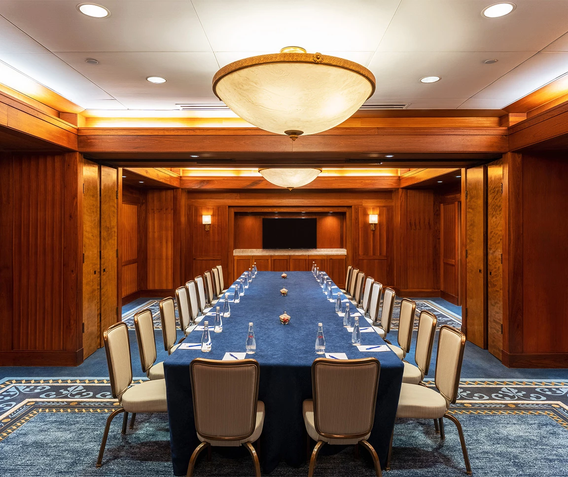 a dining room table with chairs around it