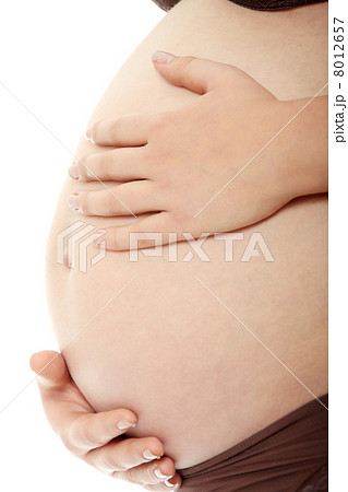 Belly of a pregnant woman 8012657