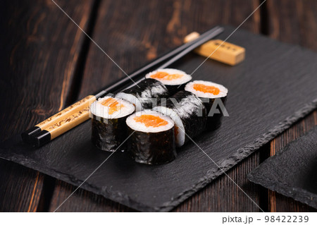 Maki sushi rolls with smoked salmon - Sushi menu. Japanese food concept 98422239