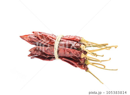 Dried chili peppers on white background 105383814