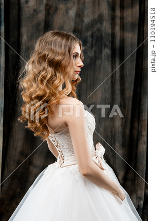 Portrait of beautiful woman with long wavy hair 110194518