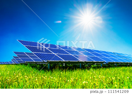 Blue solar panels under deep blue sky 111541209