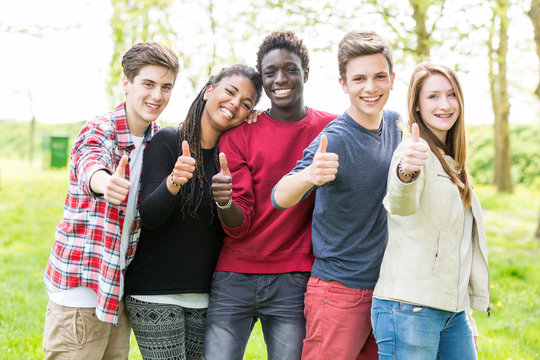 Multiethnic Group of Teenagers with Thumbs Up