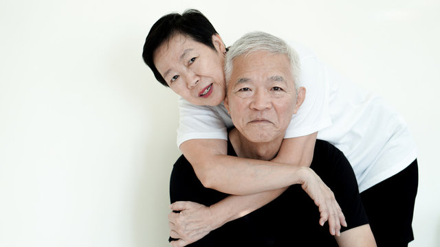 Asian senior couple smile, life with no worry on white background