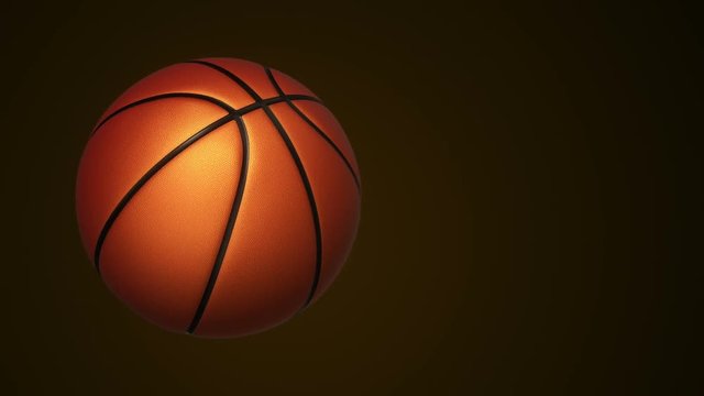 Animation of slow rotation ball for basketball game. View of close-up with realistic texture and light. Animation of seamless loop.