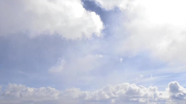 Winter in Northern Michigan Ice on Lake Michigan Sunny Hyperlaps Timelaps Clouds Forming over Snow Covered City.