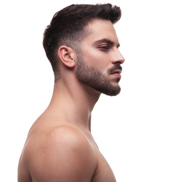 side view of a naked man looking away superior