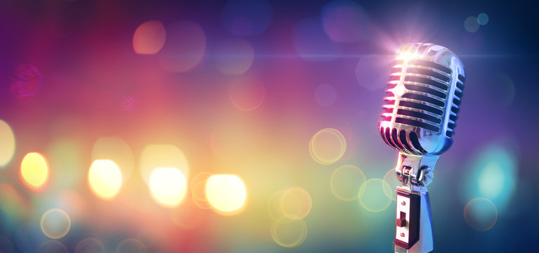 Retro Microphone On Stage With Bokeh Light