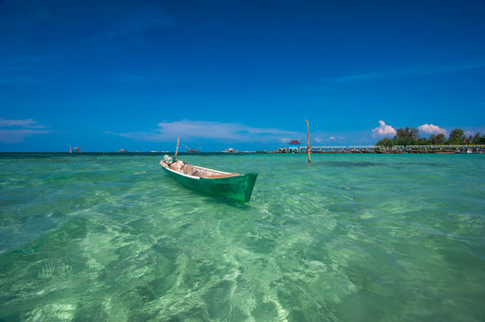 beautiful beach and old boats, Bintan Island, Indonesia