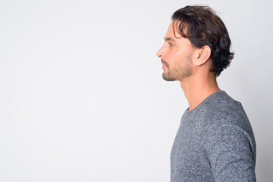 Closeup profile view of handsome Hispanic man