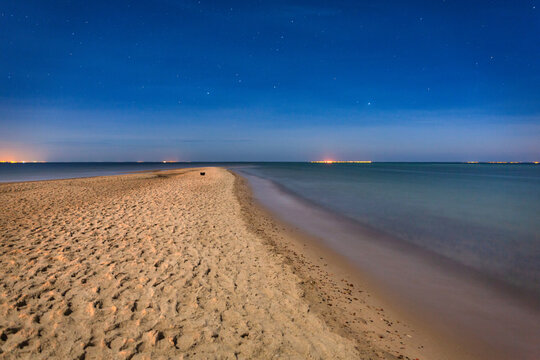 Beautiful beach of the Baltic Sea in Rewa at night, Poland