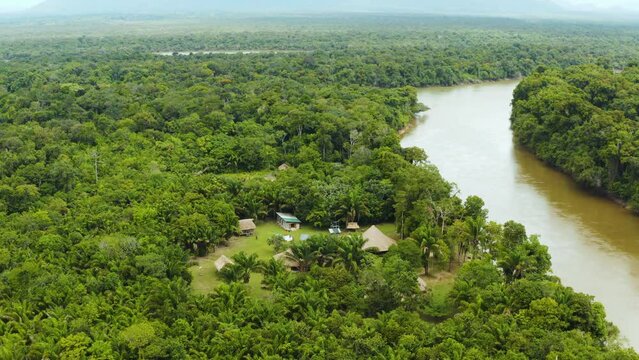 Gorgeous aerial shot of Rewa Village along the banks of The Rewa river in Guyana