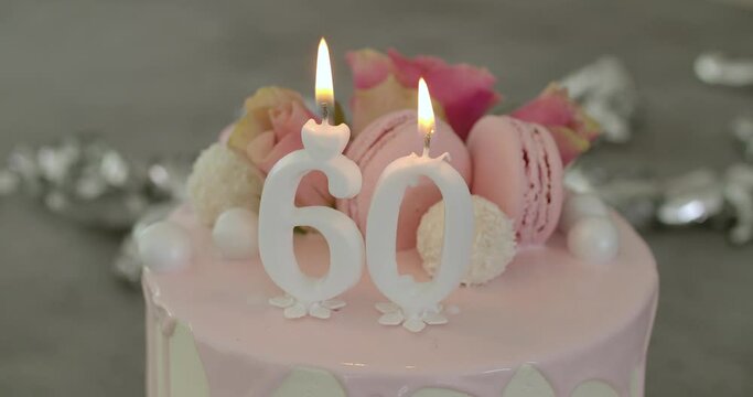 60th White Birthday Cake With Candles