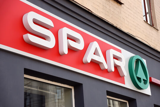 KHARKIV, UKRAINE - AUGUST 29, 2021 Spar logo on a wall. Spar is an international group of independently owned and operated retailers and wholesalers who work together in partnership