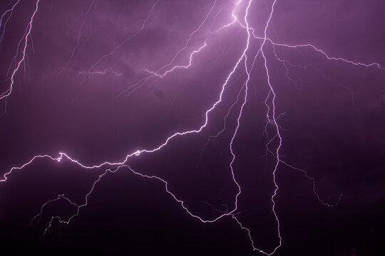 Close-up of lightning in a purple sky, Indonesia