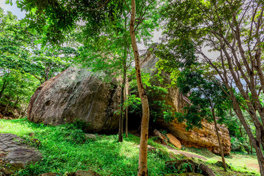 Natural background of clear sky, amidst the blue sky at the viewpoint, there are trees, sun, water retention dam, a nature stop for tourists.