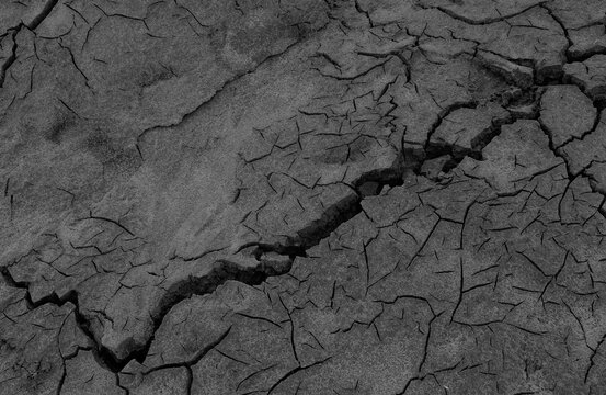 Pattern Of Cracks In Dehydrated Ground Grayscale Stock Photo. Global Heating Illustrative Image