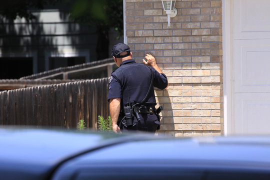 policeman searching for suspect