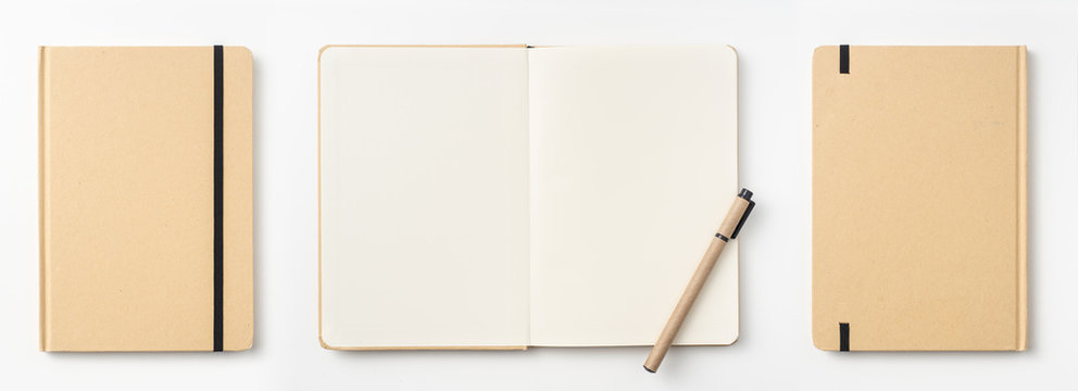 Top view of kraft paper notebook, page, pencil