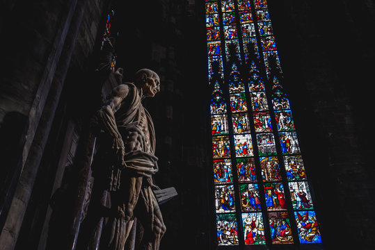 MILAN, ITALY - AUGUST 20, 2018: St. Bartholomew statue in Duomo di Milano (Dome of Milan), Milan, Italy. St Bartholomew was one of 12 Apostles and an early Christian martyr that was skinned