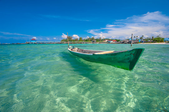 beautiful beach and old boats, Bintan Island, Indonesia