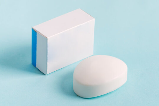 Soap wrap Box Mock-up package and bar soap isolated on blue background