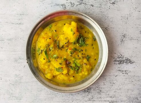 alu sabzi tarkari or potato vegetable served in a plate isolated on background top view of indian and pakistani desi food