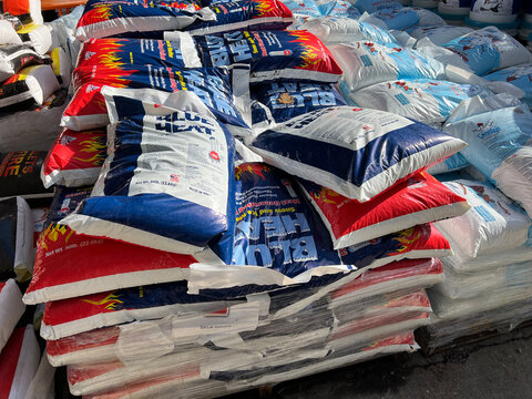 bags of road salt for winter at the hardware store