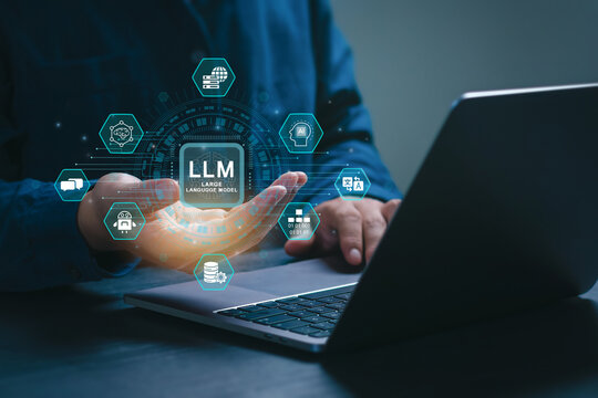 LLM, AI Large Language Model concept. Businessman working on laptop and holding LLM icons on screen. A language model distinguished by its general-purpose language generation capability. Chat AI.