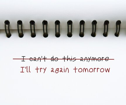 Notebook written "I can't do this anymore" replace with  "I'll try again tomorrow" means to replace negative thought with positive self-talk