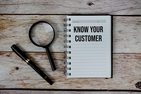 Know Your Customer (KYC) text on notepad, Business and Financial concept background