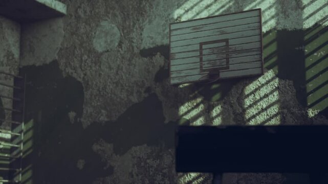 A basketball court shows peeling paint and shadows cast by sunlight filtering through a barred window. The textured walls create an urban atmosphere, hinting at years of use.