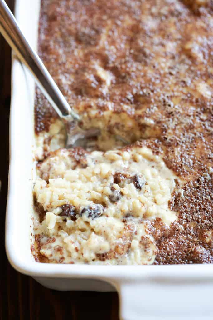 A close up photo of rice pudding that has been baked in 