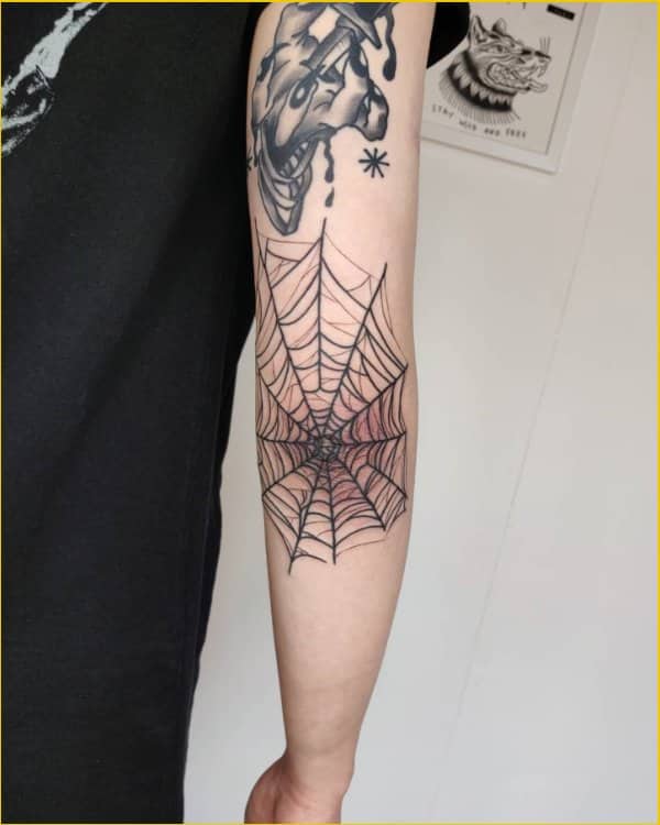 spider web tattoos o elbow