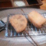 串之家 さわ - 蓮根カレー詰めと子持昆布
