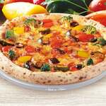 Pizza with lots of green and yellow vegetables