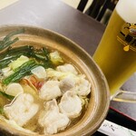 Ashikaga Kenko Land Oshokuji Dokoro - もつ鍋の汁はもったいので、定食のライスをおじやにしました。