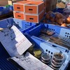 ゆりあげ港朝市 - 料理写真:商品の数々。落札した人の札の番号が書いてありますね。