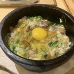 Tori Ichimonme - 進化系極石焼親子丼￥1,200 店員さん（店長かも）の仕上げ後（混ぜてくれました） 接写