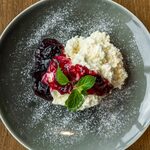 Rich and smooth creme d'ange with blueberry sauce