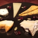 Assorted mature cheeses with crackers