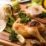 Grilled half chicken with herbs